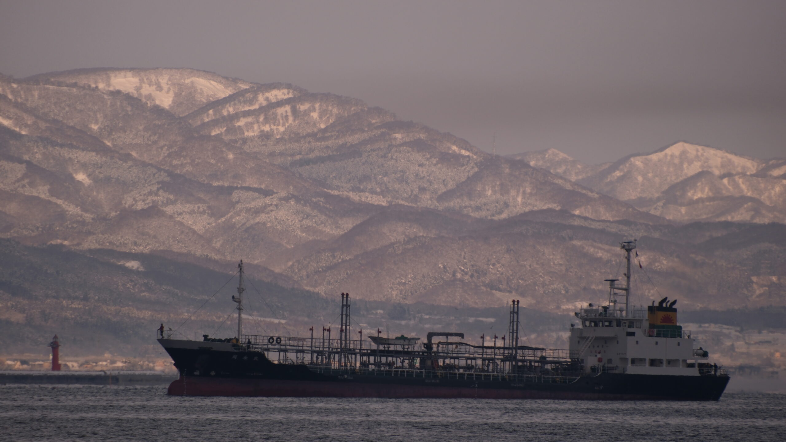 Cargo Ship and Snowy Mountains in Hakodate, Hokkaido