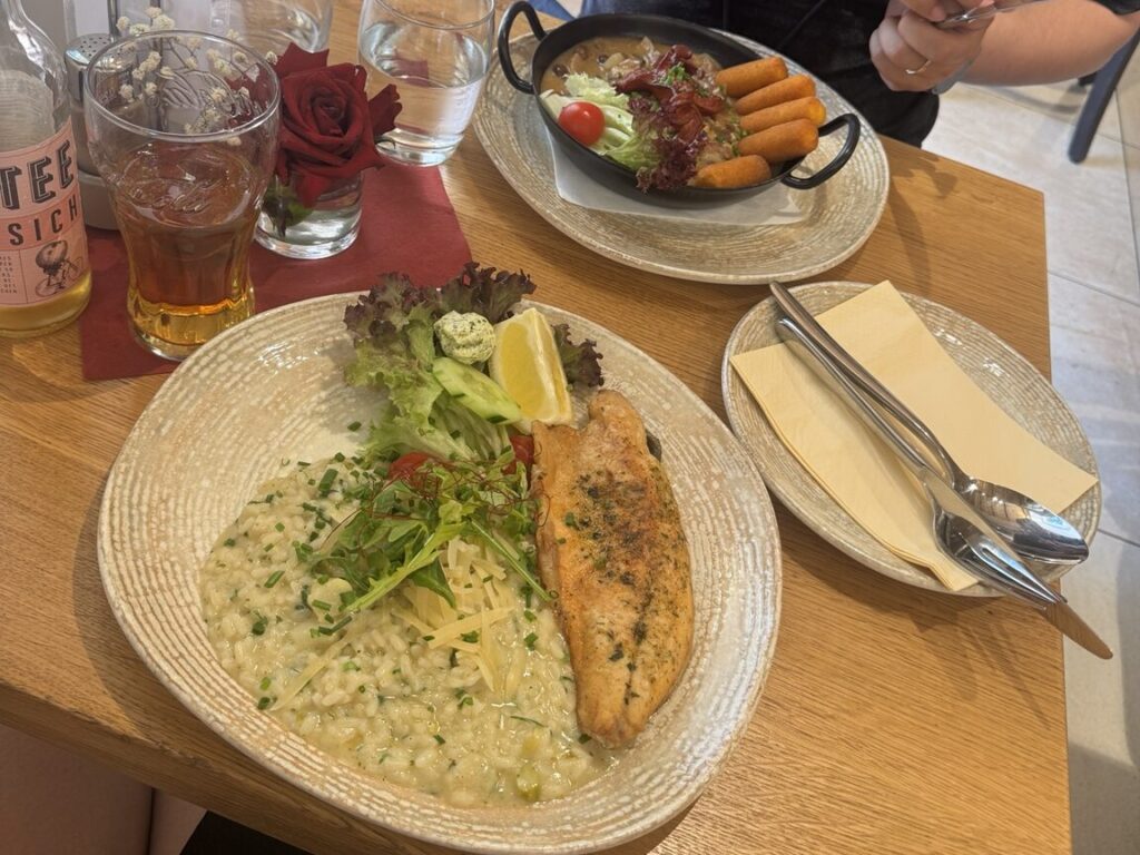 Grilled salmon risotto served at a restaurant in Hallstatt Austria